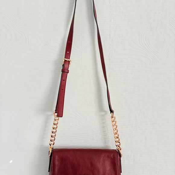 Michael Kors Handbags - Michael Kors Burgundy Crossbody Bag with Gold Chain. Elegant pebble leather.